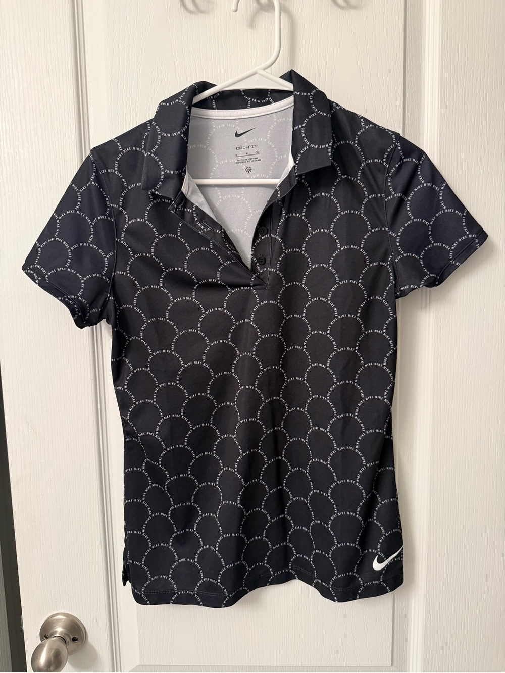 Nike Women’s Black Short-Sleeve Button-Down Polo with White Dot Arc Pattern
